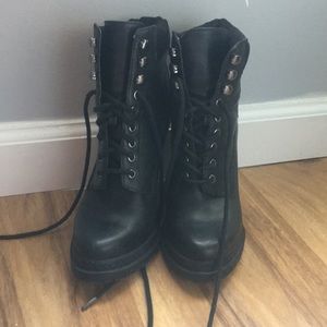 . Black Leather BCBGeneration heel boots